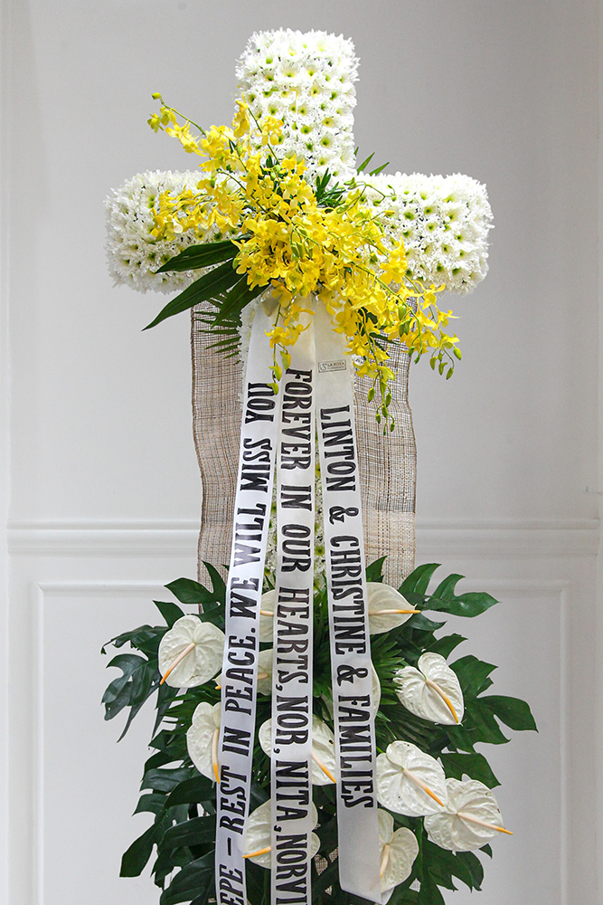 Cross Floral Arrangement by La Rosa Flower Shop