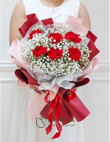 Euphoria  - A bouquet of 6 pieces red carnations and gypsophilia by LaRosa Flower Shop Quezon City