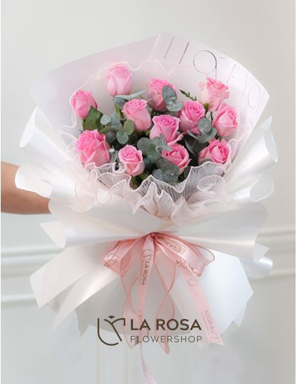 Lush Lullaby - A bouquet of dozen imported hot pink roses by LaRosa Flower Shop Quezon City