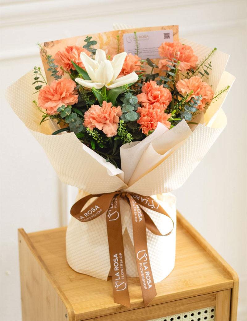 Soft Peach Carnations arranged in a delicate bouquet for a romantic occasion in Makati