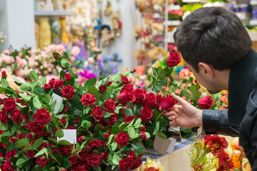 Customer browsing cheap Valentine's Day bouquets in the Philippines