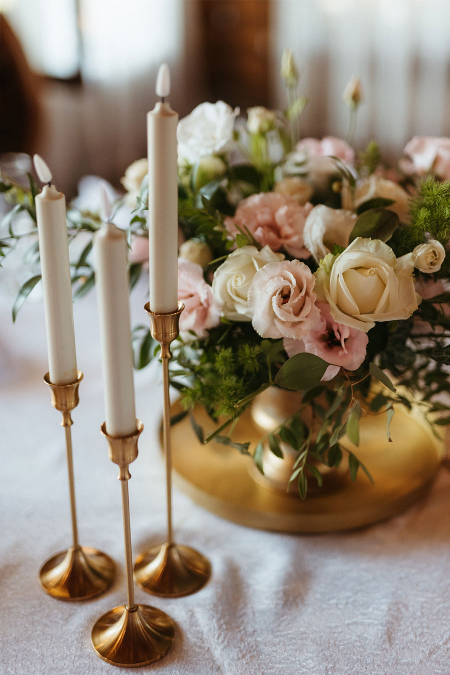Candles with affordable all saints day flowers in Philippines